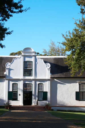 Old South African building used as a hotel/ guest lodge. Shot on a sunny summer day.の写真素材