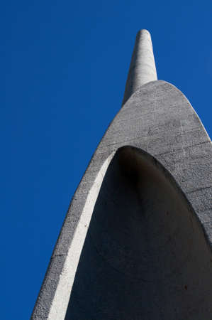 Afrikaans Language Monument shot on blue sky background in Paarl, Western Cape, South Africa. The longest tower of the monument shot from the bottom up.の写真素材