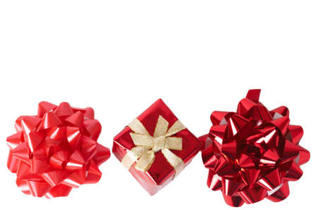 Red mini gift box with two bows on either side isolated on white background with copy space