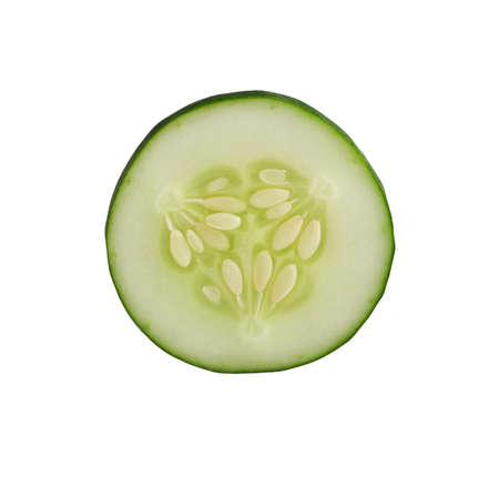 Round cucumber slice isolated on white background. Seasonal vegetable in a cutの写真素材