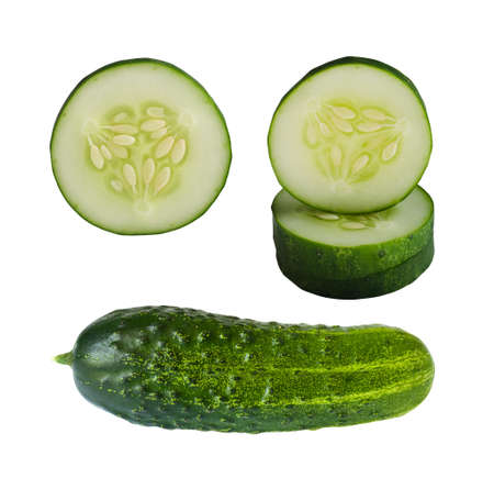 Set of one whole cucumber and several round slices isolated on a white background. Collection of summer vegetables elements. Image for packaging design of organic products, cosmetics.の写真素材