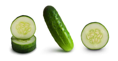 Set of one whole cucumber, several round slices isolated on white background. Vegetable for organic farm products packaging design. Healthy food. Ingredient for diet salad.の写真素材