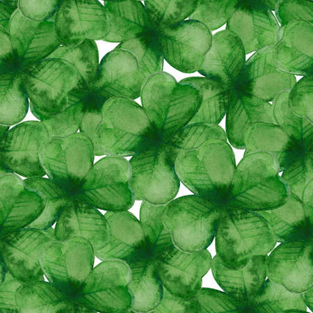 Watercolor seamless pattern with green four leaf clovers. St. Patrick's Day celebrations decorative...