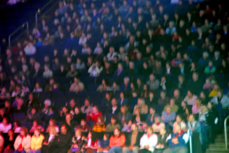 Spectators in an arena, image is blurred intentionally to remove detailの写真素材