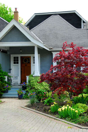 Cozy home with beautuful landscapingの写真素材