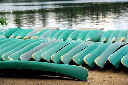 Canoes on lake shore in northern Ontarioの写真素材