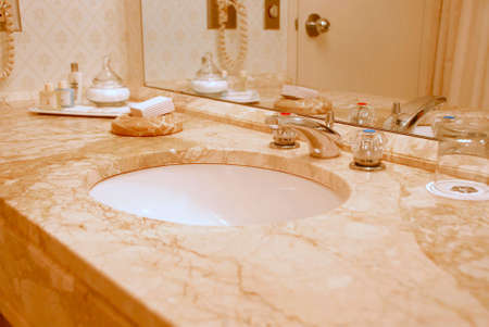 Luxury bathroom interior in beige tonesの写真素材