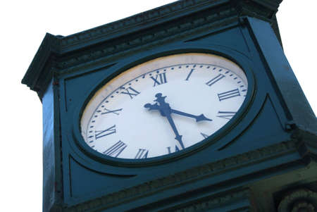 Old public clock outside of a train station