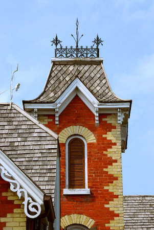 Fragment of a beautiful red brick victorian house