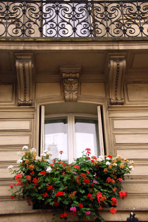 Windows and balconies of old apartment buildings in Paris Franceの写真素材