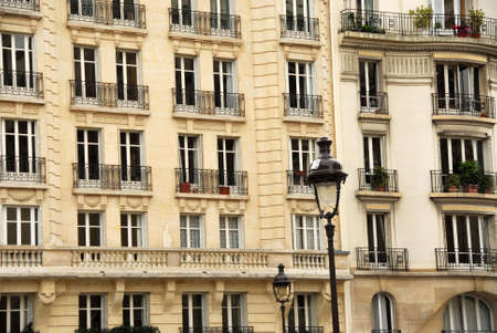Windows and balconies of old apartment buildings in Paris Franceの写真素材