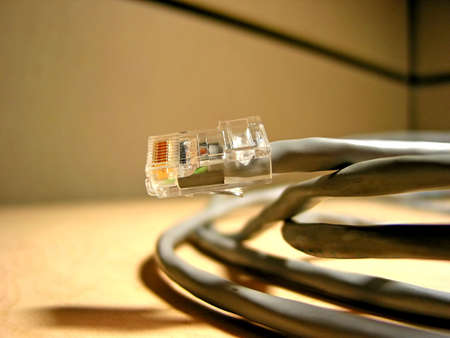 Internet cable on the office desk, closeup