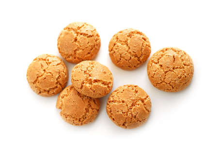 Traditional italian almond cookies - amaretti, isolated on white background Traditional italian almond cookies - amaretti, isolated on white background