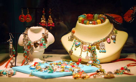 Fashion jewelry displayed in a jewelry store windowの写真素材