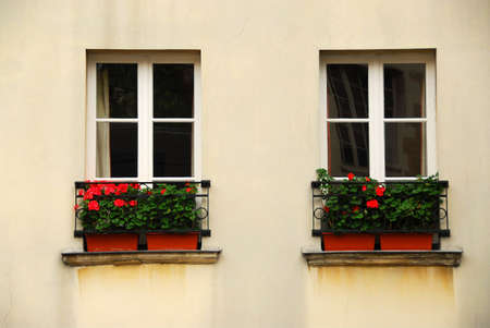 Windows with flower boxes in Paris Franceの写真素材