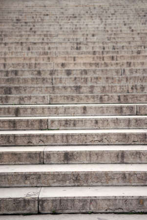 Long concrete stairway, focus on the bottom steps