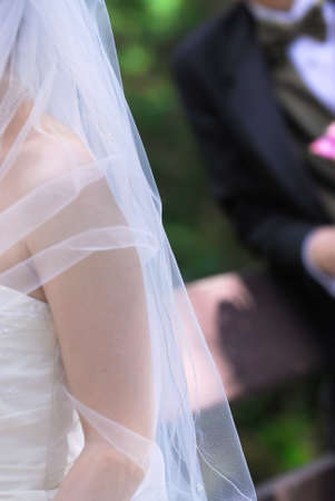 Bride and groom on their wedding day outsideの写真素材