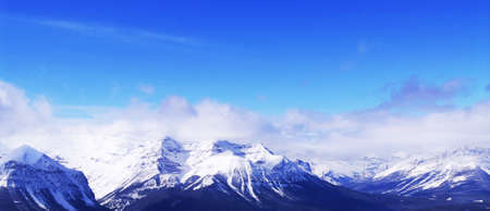 Snowy mountain ridges at Lake Louise ski resort in Canadian Rockies, panoramic viewの写真素材