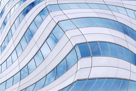Abstract background of distorted office building wallsの写真素材