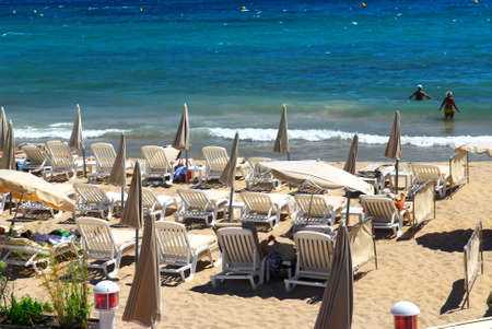 Sandy beach along Croisette promenade in Cannes Franceの写真素材