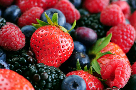Background of assorted fresh berries close up