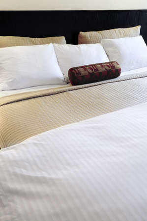 Comfortable bed in upscale hotel close up