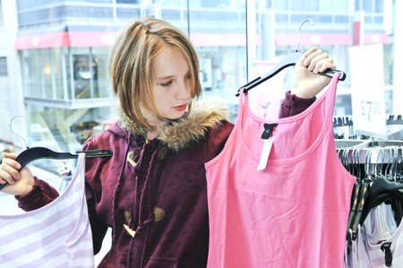 Teenage girl shopping for clothes and accessoriesの写真素材