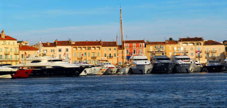 Luxury boats anchored in St. Tropez in French Rivieraの写真素材