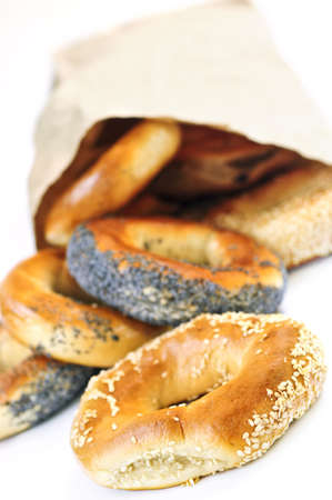 Fresh Montreal style bagels in paper bag on white backgroundの写真素材