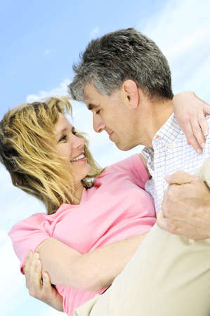 Mature romantic couple of  boomers enjoying outdoors
