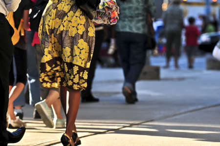 Crowd of people walking on a streetの写真素材