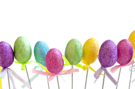Cute Easter toy eggs isolated on white background