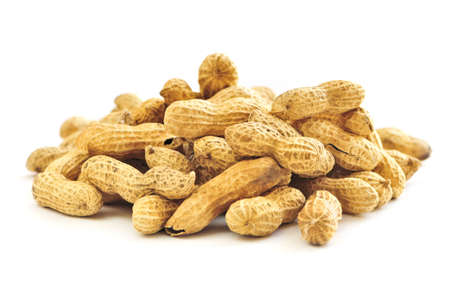 Closeup on pile of peanuts with shells