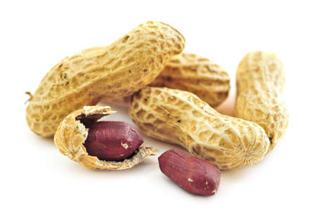 Closeup of peanuts with and without shells