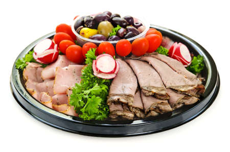 Isolated platter of assorted cold cut meat slicesの写真素材