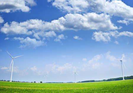 Green alternative clean power wind turbines in field