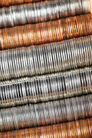 Background of penny nickel dime and quarter stacked coins