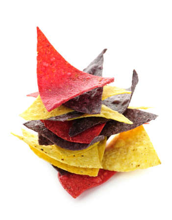 Stack of colorful tortilla chips isolated on white backgroundの写真素材