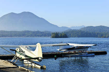 Seaplanes at dock in Tofino on Pacific coast of British Columbia, Canadaの写真素材