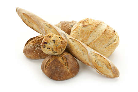 Assorted kinds of bread on white backgroundの写真素材