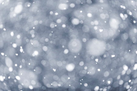 Background of snow flurry falling in winter with some motion blurの写真素材