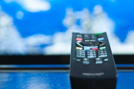 Television remote control closeup pointing at tvの写真素材