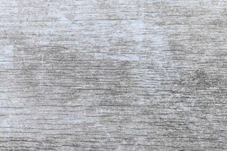 Old wooden background of weathered distressed rustic wood with faded light blue paint showing woodgrain textureの写真素材