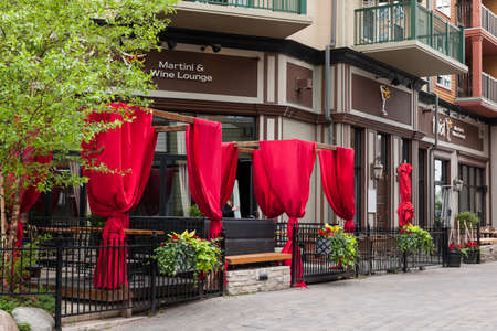 COLLINGWOOD, ON, CANADA - JUNE 18: Summer view of Twist Martini & Wine Lounge patio in Blue Mountain Village, 2014のeditorial素材