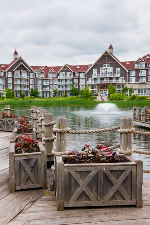 COLLINGWOOD, ON, CANADA - JUNE 18: View of Mill pond with fountain in summer at Blue Mountain Village, 2014のeditorial素材