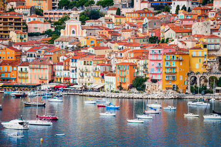 VILLEFRANCHESURMER FRANCE  OCTOBER 1 2014: Colorful waterfront of picturesque French Riviera town with leisure boats anchored in harbor.のeditorial素材