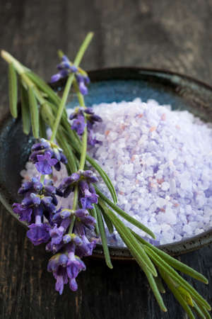 Lavender bath salts herbal body care product with fresh flowers close upの写真素材
