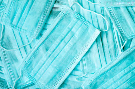 Background of blue medical masks. Means of self-defense against viruses. Health.の写真素材