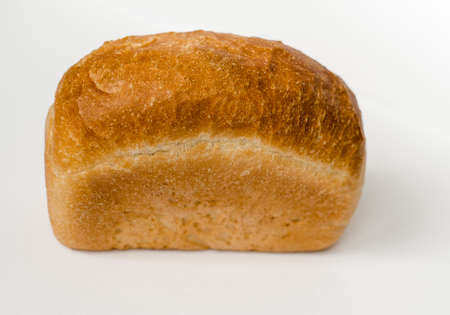 A loaf of bread on a light gray background. Bakery product. The products of the first necessity.の写真素材