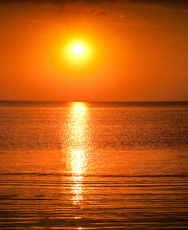 Beautiful sunset above the sea の写真素材